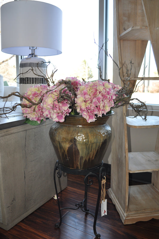 Green metal pot with stand with Pink Hydrangea Floral Arrangement